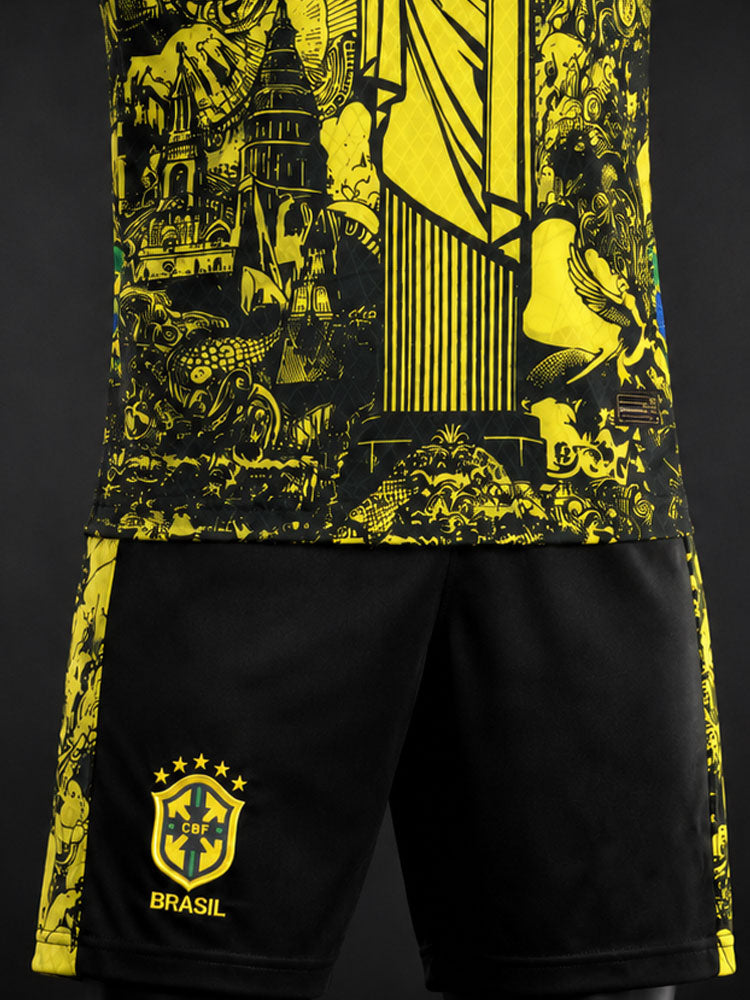 Détail du short noir Brésil et bas du maillot jaune et noir, motif Christ Rédempteur doré